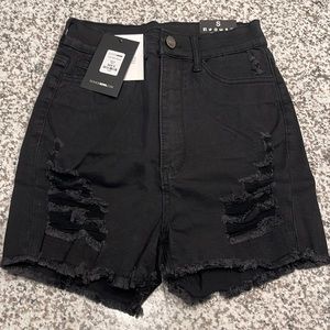 Distressed black shorts